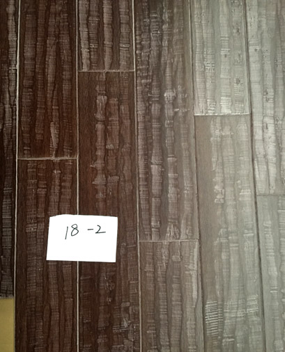 Distressed hand sculpting strand woven bamboo flooring